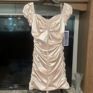 Short dress fancy baby pink satin size 7